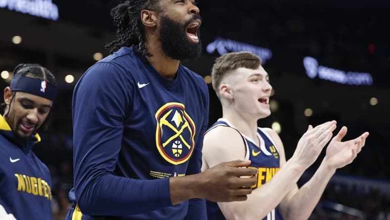 Nov 23, 2022; Oklahoma City, Oklahoma, USA; Denver Nuggets center DeAndre Jordan (6) and guard Christian Braun (0) watch their team play against the Oklahoma City Thunder during the second half at Paycom Center. Denver won 131-126 during overtime. Mandatory Credit: Alonzo Adams-USA TODAY Sports