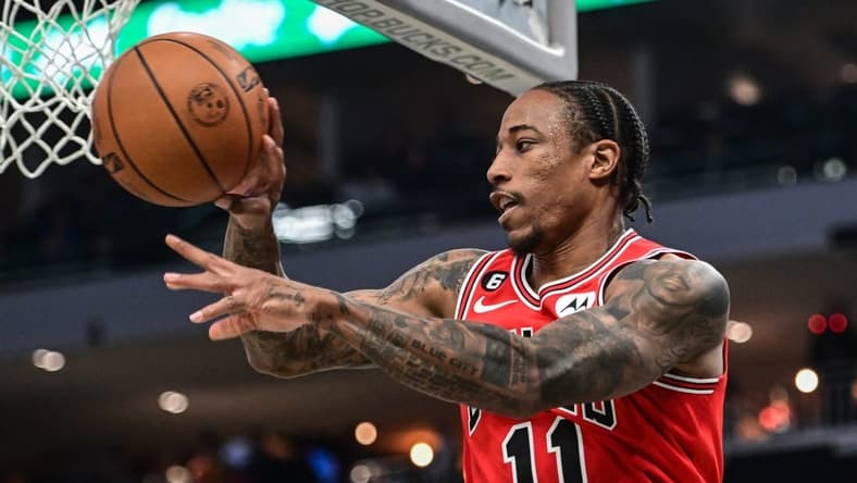 Nov 23, 2022; Milwaukee, Wisconsin, USA; Chicago Bulls forward DeMar DeRozan (11) gets a pass away in the second quarter during game against the Milwaukee Bucks at Fiserv Forum. Mandatory Credit: Benny Sieu-USA TODAY Sports