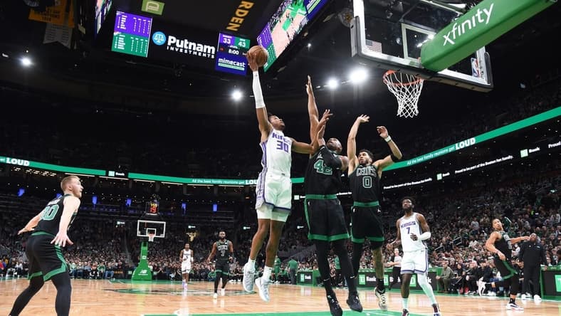 Nov 25, 2022; Boston, Massachusetts, USA; Sacramento Kings forward KZ Okpala (30) shoots the ball over Boston Celtics center Al Horford (42) during the first half at TD Garden. Mandatory Credit: Bob DeChiara-USA TODAY Sports