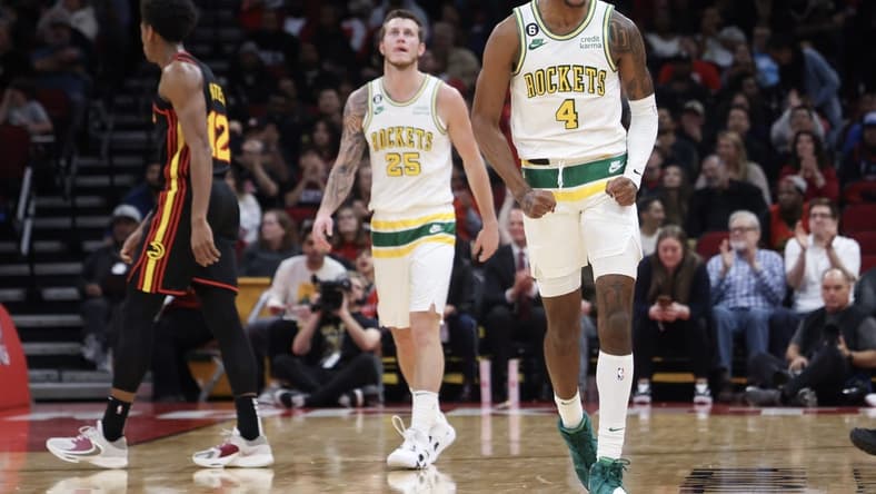 Nov 25, 2022; Houston, Texas, USA; Houston Rockets guard Jalen Green (4) reacts to his basket against the Atlanta Hawks in the fourth quarter at Toyota Center. Mandatory Credit: Thomas Shea-USA TODAY Sports