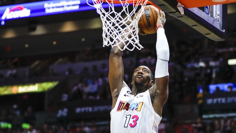 Nov 25, 2022; Miami, Florida, USA; Miami Heat center Bam Adebayo (13) dunks the ball during the fourth quarter against the Washington Wizards at FTX Arena. Mandatory Credit: Sam Navarro-USA TODAY Sports