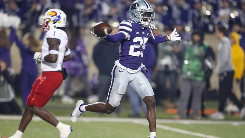 Nov 26, 2022; Manhattan, Kansas, USA; Kansas State Wildcats cornerback Ekow Boye-Doe (25) celebrates a fumble recovery during the first quarter against the Kansas Jayhawks at Bill Snyder Family Football Stadium. Mandatory Credit: Scott Sewell-USA TODAY Sports