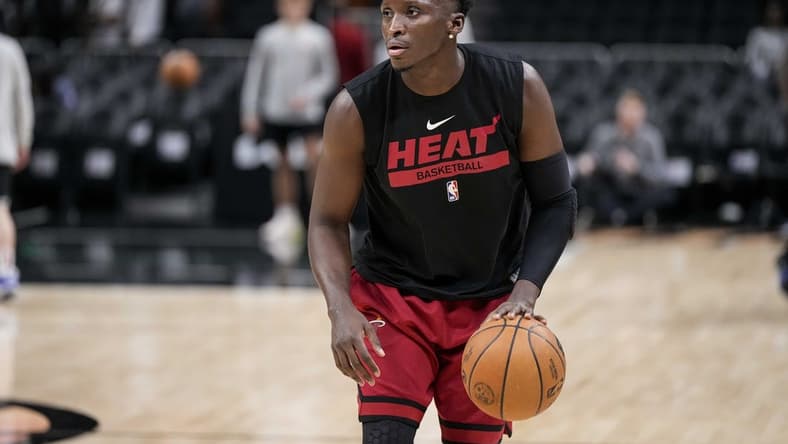 Nov 27, 2022; Atlanta, Georgia, USA; Miami Heat guard Victor Oladipo (4) warms up prior to the game against the Atlanta Hawks at State Farm Arena. Mandatory Credit: Dale Zanine-USA TODAY Sports