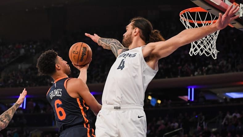 Nov 27, 2022; New York, New York, USA; Memphis Grizzlies center Steven Adams (4) attempts to block a shot by New York Knicks guard Quentin Grimes (6) during the first quarter at Madison Square Garden. Mandatory Credit: Dennis Schneidler-USA TODAY Sports