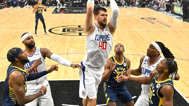 Nov 27, 2022; Los Angeles, California, USA; Los Angeles Clippers center Ivica Zubac (40) grabs a rebound in the first half against the Indiana Pacers at Crypto.com Arena. Mandatory Credit: Jayne Kamin-Oncea-USA TODAY Sports