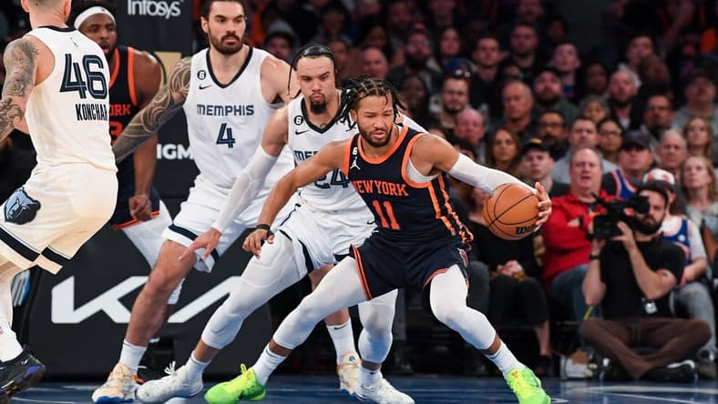 Nov 27, 2022; New York, New York, USA; New York Knicks guard Jalen Brunson (11) makes a move defended by Memphis Grizzlies forward Dillon Brooks (24) during the fourth quarter at Madison Square Garden. Mandatory Credit: Dennis Schneidler-USA TODAY Sports