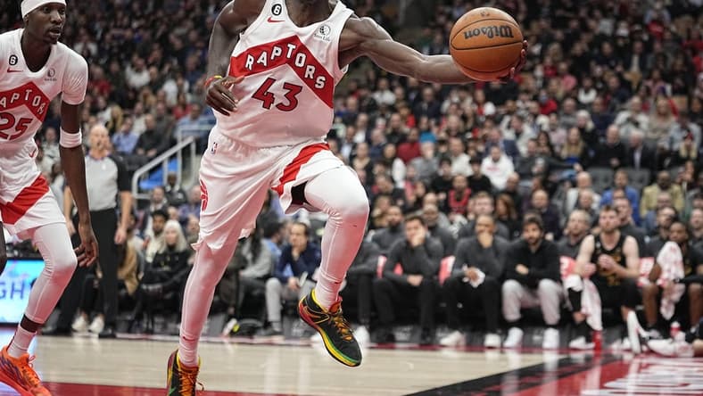 Nov 28, 2022; Toronto, Ontario, CAN; Toronto Raptors forward Pascal Siakam (43) keeps a ball in play against the Cleveland Cavaliers during the second half at Scotiabank Arena. Mandatory Credit: John E. Sokolowski-USA TODAY Sports