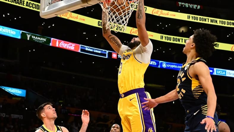 Nov 28, 2022; Los Angeles, California, USA; Los Angeles Lakers forward Anthony Davis (3) dunks in the second half against the Indiana Pacers at Crypto.com Arena. Mandatory Credit: Richard Mackson-USA TODAY Sports