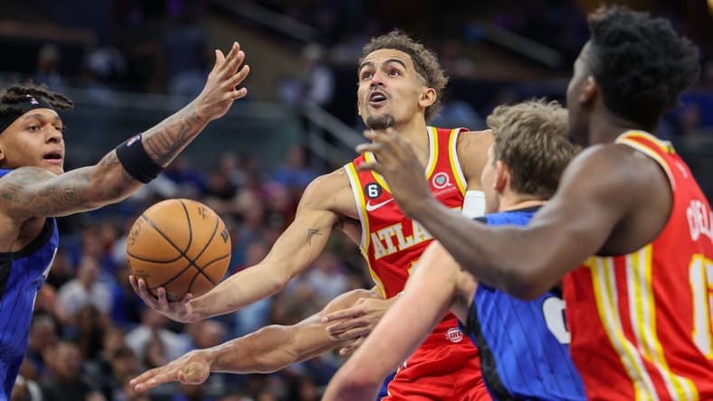 Nov 30, 2022; Orlando, Florida, USA;  Atlanta Hawks guard Trae Young (11) drives to the hoop against the Orlando Magic in the second quarter at Amway Center. Mandatory Credit: Nathan Ray Seebeck-USA TODAY Sports