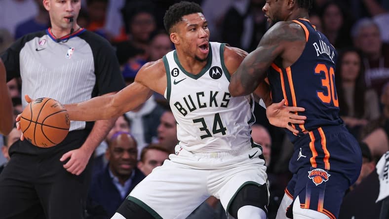 Nov 30, 2022; New York, New York, USA; Milwaukee Bucks forward Giannis Antetokounmpo (34) dribbles against New York Knicks forward Julius Randle (30) during the first half at Madison Square Garden. Mandatory Credit: Vincent Carchietta-USA TODAY Sports