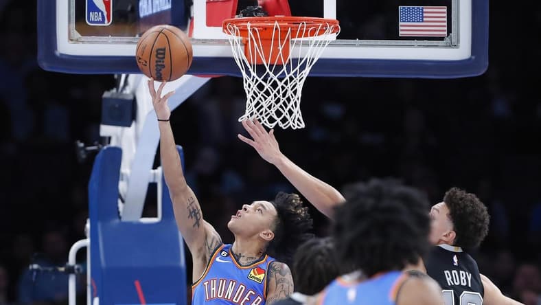 Nov 30, 2022; Oklahoma City, Oklahoma, USA; Oklahoma City Thunder guard Tre Mann (23) shoots against the San Antonio Spurs during the second quarter at Paycom Center. Mandatory Credit: Alonzo Adams-USA TODAY Sports