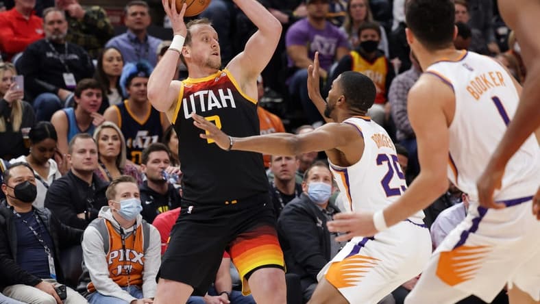Jan 26, 2022; Salt Lake City, Utah, USA; Utah's Joe Ingles (2) passes the ball away from Phoenix Suns forward Mikal Bridges (25) during the first quarter at Vivint Arena. Mandatory Credit: Chris Nicoll-USA TODAY Sports