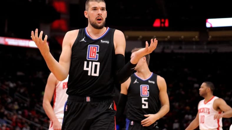 Feb 27, 2022; Houston, Texas, USA; LA Clippers center Ivica Zubac (40) reacts to a foul call against the Houston Rockets during the fourth quarter at Toyota Center. Mandatory Credit: Erik Williams-USA TODAY Sports