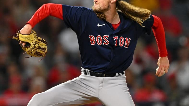 Jun 8, 2022; Anaheim, California, USA; Boston Red Sox relief pitcher Matt Strahm (55) throws during the ninth inning earning a save to defeat the Los Angeles Angels for their 14th loss in a row at Angel Stadium. Mandatory Credit: Jayne Kamin-Oncea-USA TODAY Sports