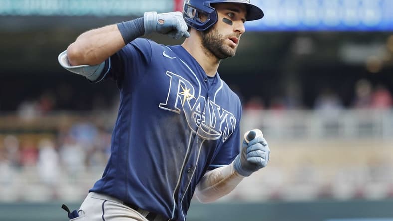 Jun 12, 2022; Minneapolis, Minnesota, USA; Tampa Bay Rays center fielder Kevin Kiermaier (39) runs the bases on his solo home run against the Minnesota Twins in the eighth inning at Target Field. Mandatory Credit: Bruce Kluckhohn-USA TODAY Sports