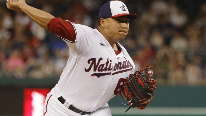 Jun 13, 2022; Washington, District of Columbia, USA; Washington Nationals starting pitcher Erasmo Ramirez (61) pitches against the Atlanta Braves during the first inning at Nationals Park. Mandatory Credit: Geoff Burke-USA TODAY Sports
