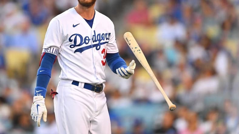 Jul 8, 2022; Los Angeles, California, USA; Los Angeles Dodgers center fielder Cody Bellinger (35) reacts as he walks back to the dugout after striking out with bases loaded in the second inning against the Chicago Cubs at Dodger Stadium. Mandatory Credit: Jayne Kamin-Oncea-USA TODAY Sports