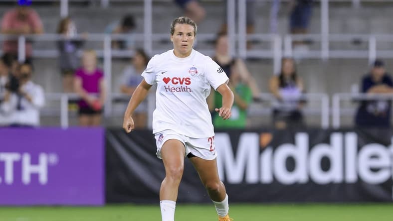Aug 5, 2022; Louisville, Kentucky, USA; Washington Spirit defender Amber Brooks (22) controls the ball against Racing Louisville FC at Lynn Family Stadium. Mandatory Credit: Aaron Doster-USA TODAY Sports