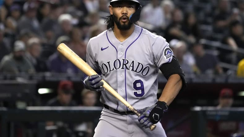 Aug 7, 2022; Phoenix, Arizona, USA; Colorado Rockies left fielder Connor Joe (9) reacts after striking out against the Arizona Diamondbacks in the sixth inning at Chase Field. Mandatory Credit: Rick Scuteri-USA TODAY Sports