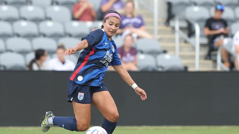 Aug 17, 2022; Louisville, Kentucky, USA; OL Reign midfielder Marley Canales (13) in action against Club America in the first half of a Women's Cup semifinal match at Lynn Family Stadium. Mandatory Credit: EM Dash-USA TODAY Sports
