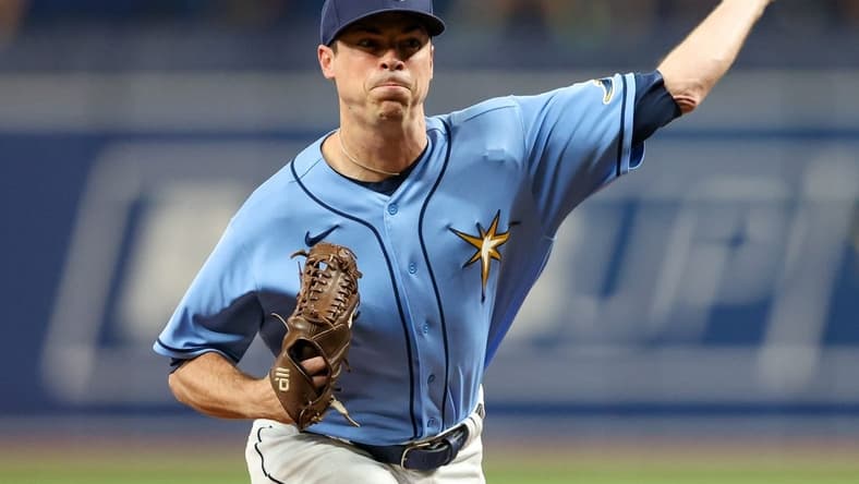 Aug 23, 2022; St. Petersburg, Florida, USA; Tampa Bay Rays relief pitcher Brooks Raley (30) throws a pitch against the Los Angeles Angels in the seventh inning at Tropicana Field. Mandatory Credit: Nathan Ray Seebeck-USA TODAY Sports