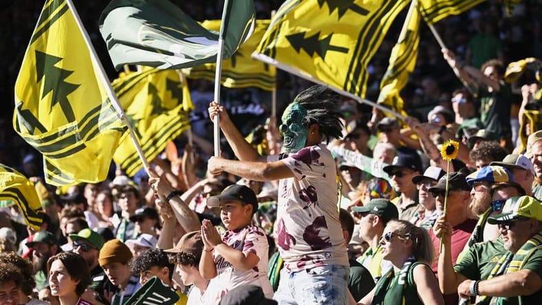 Sep 4, 2022; Portland, Oregon, USA; Portland Timbers fans cheer for the home team during the second half against Atlanta United at Providence Park. The Timbers won 2-1. Mandatory Credit: Troy Wayrynen-USA TODAY Sports