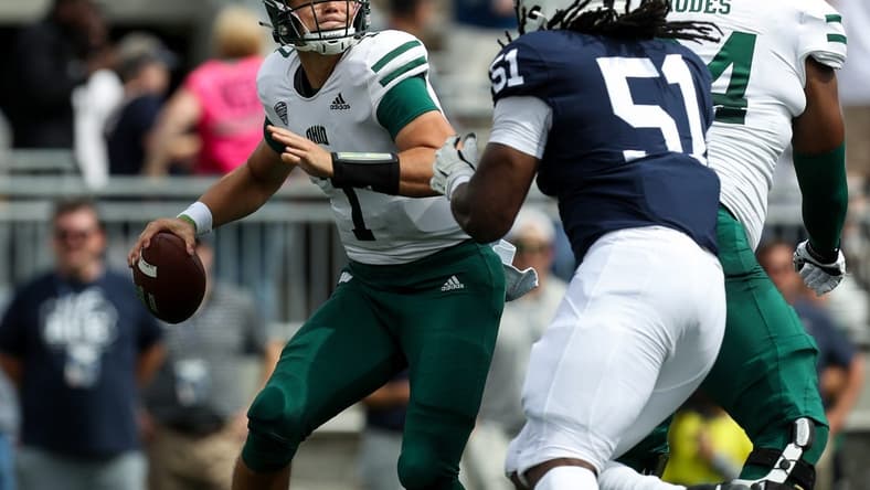 Sep 10, 2022; University Park, Pennsylvania, USA; Ohio Bobcats quarterback Kurtis Rourke (7) is pressured by Penn State Nittany Lions defensive tackle Hakeem Beamon (51) during the first quarter at Beaver Stadium. Mandatory Credit: Matthew OHaren-USA TODAY Sports