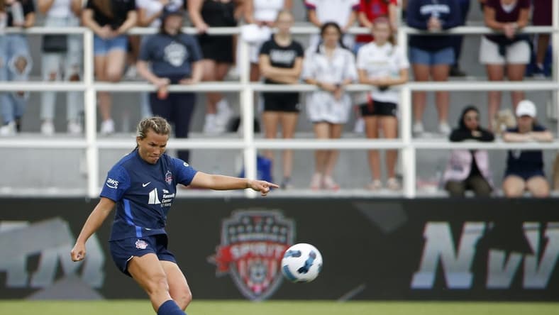 Sep 10, 2022; Washington, District of Columbia, USA; Washington Spirit defender Amber Brooks (22) crosses against San Diego Wave FC in the first half at Audi Field. Mandatory Credit: Amber Searls-USA TODAY Sports
