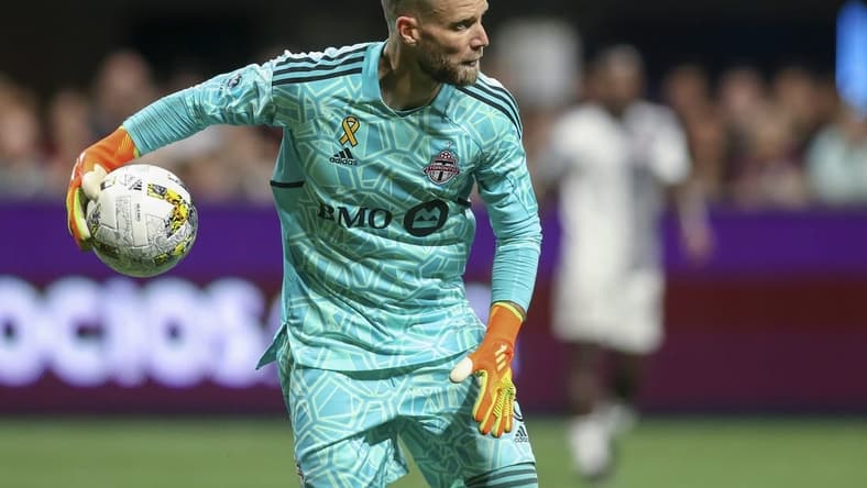 Sep 10, 2022; Atlanta, Georgia, USA; Toronto FC goalkeeper Quentin Westberg (16) puts the ball in play against Atlanta United in the second half at Mercedes-Benz Stadium. Mandatory Credit: Brett Davis-USA TODAY Sports