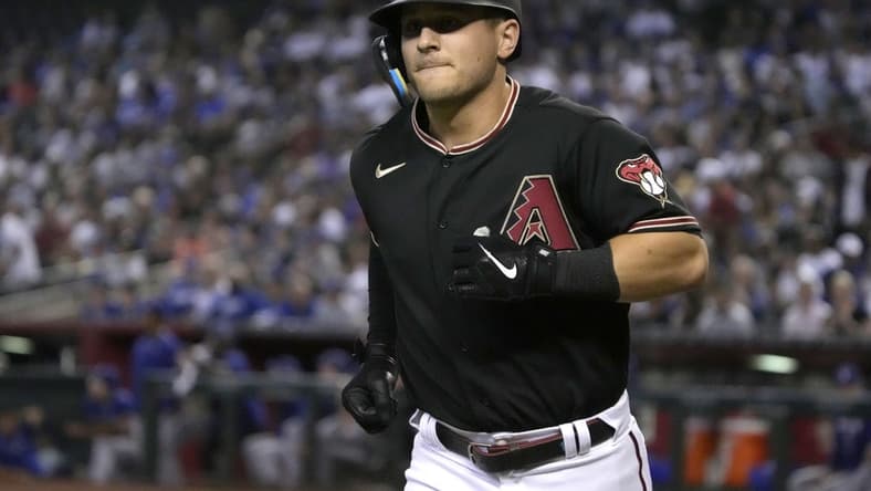 Sep 14, 2022; Phoenix, Arizona, USA; Arizona Diamondbacks right fielder Daulton Varsho (12) rounds the bases after hitting a solo home run against the Los Angeles Dodgers in the first inning at Chase Field. Mandatory Credit: Rick Scuteri-USA TODAY Sports