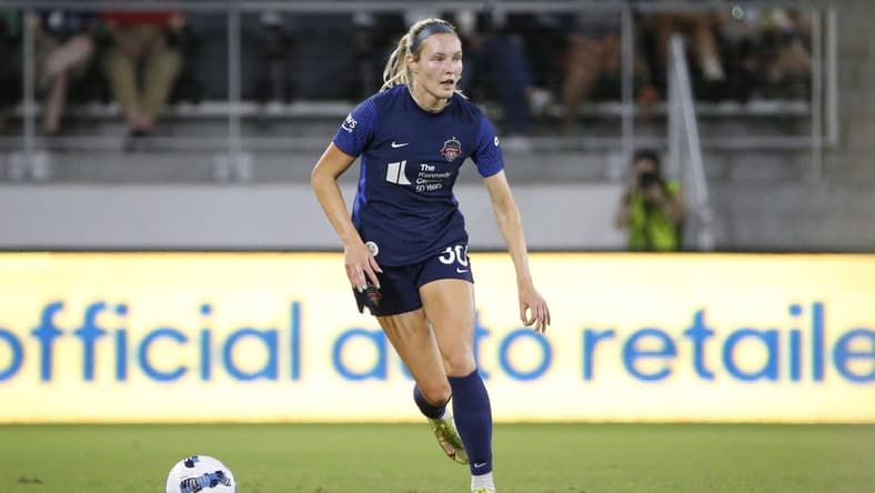 Sep 17, 2022; Washington, District of Columbia, USA; Washington Spirit defender Camryn Biegalski (30) looks to pass against New Jersey/New York Gotham FC in the first half at Audi Field. Mandatory Credit: Amber Searls-USA TODAY Sports