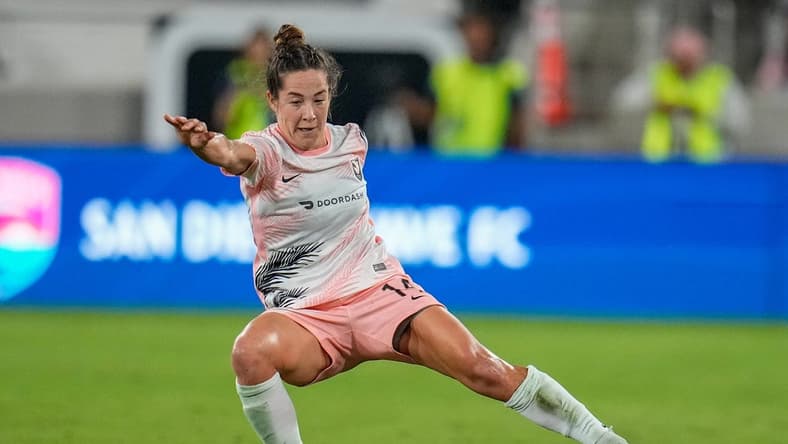 Sep 17, 2022; San Diego, California, USA;  Angel City FC defender Paige Nielsen (14) shoots the ball during the first half against San Diego Wave FC at Snapdragon Stadium. Mandatory Credit: Ray Acevedo-USA TODAY Sports