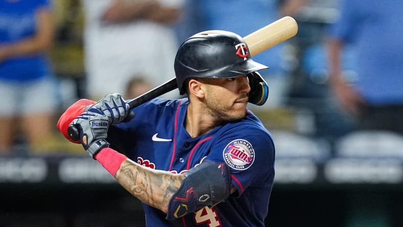 Sep 20, 2022; Kansas City, Missouri, USA; Minnesota Twins shortstop Carlos Correa (4) bats against the Kansas City Royals during the ninth inning at Kauffman Stadium. Mandatory Credit: Jay Biggerstaff-USA TODAY Sports