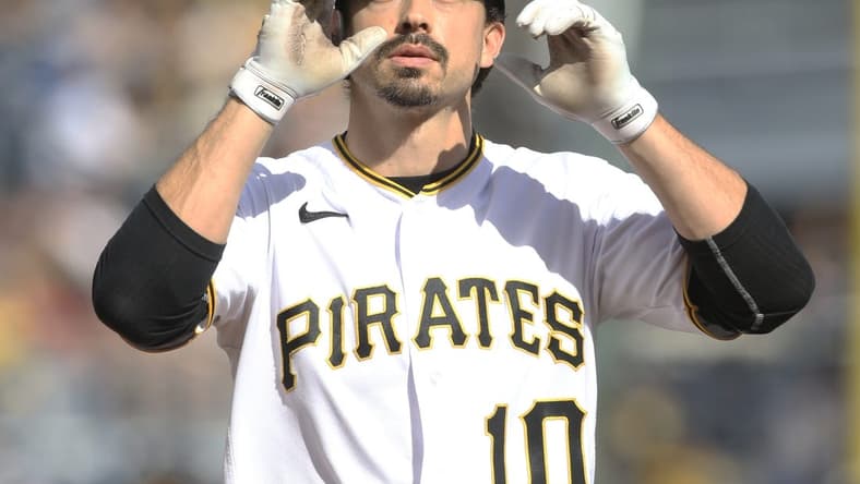 Sep 25, 2022; Pittsburgh, Pennsylvania, USA; Pittsburgh Pirates center fielder Bryan Reynolds (10) reacts crossing home plate on a solo home run the Chicago Cubs during the sixth inning at PNC Park. Mandatory Credit: Charles LeClaire-USA TODAY Sports