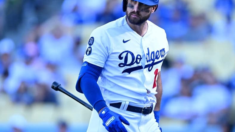 Oct 2, 2022; Los Angeles, California, USA; Los Angeles Dodgers right fielder Joey Gallo (12) walks back to the dugout after striking out in the ninth inning against the Colorado Rockies at Dodger Stadium. Mandatory Credit: Jayne Kamin-Oncea-USA TODAY Sports