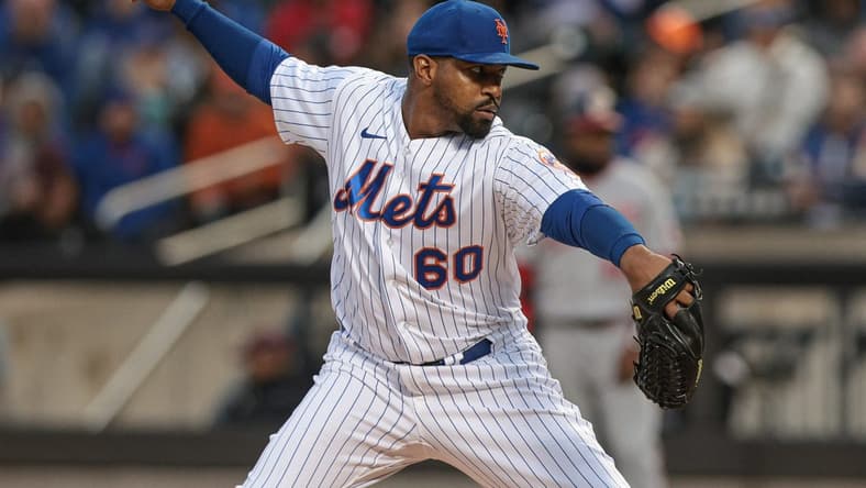 Oct 5, 2022; New York City, New York, USA; New York Mets starting pitcher Mychal Givens (60) delivers a pitch during the first inning against the Washington Nationals at Citi Field. Mandatory Credit: Vincent Carchietta-USA TODAY Sports