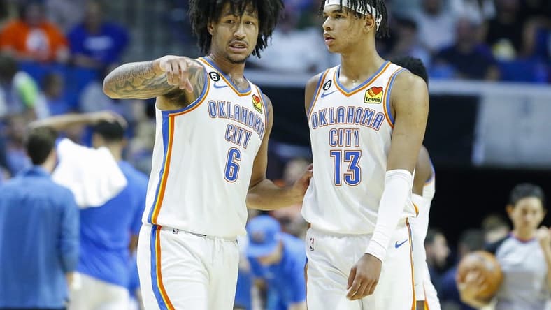 Oct 5, 2022; Tulsa, Oklahoma, USA; Oklahoma City Thunder forward Jaylin Williams (6) and forward Ousmane Dieng (13) talk during a time out against the Dallas Mavericks during the second half of a pre-season game at BOK Center. Dallas won 98-96. Mandatory Credit: Alonzo Adams-USA TODAY Sports