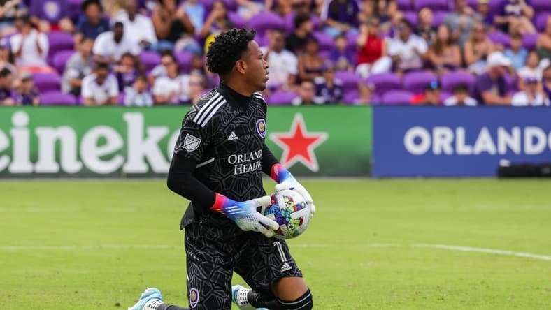 Oct 9, 2022; Orlando, Florida, USA; Orlando City goalkeeper Pedro Gallese (1) makes a save during the first half against the Columbus Crew at Exploria Stadium. Mandatory Credit: Mike Watters-USA TODAY Sports