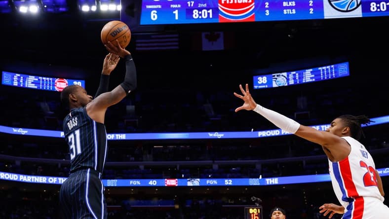Oct 19, 2022; Detroit, Michigan, USA; Orlando Magic guard Terrence Ross (31) shoots over Detroit Pistons guard Jaden Ivey (23) at Little Caesars Arena. Mandatory Credit: Rick Osentoski-USA TODAY Sports
