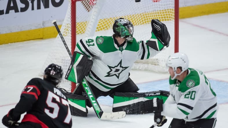Oct 24, 2022; Ottawa, Ontario, CAN; Ottawa Senators center Shane Pinto (57) scores against Dallas Stars goalie Scott Wedgewood (41) in the third period at the Canadian Tire Centre. Mandatory Credit: Marc DesRosiers-USA TODAY Sports