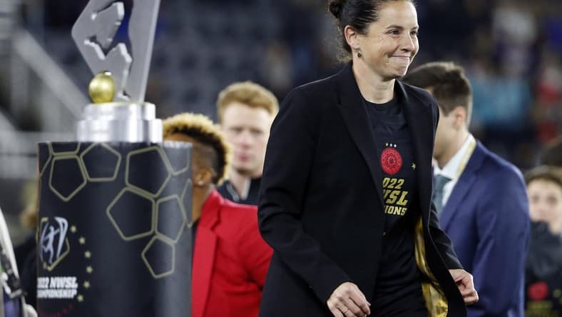 Oct 29, 2022; Washington, D.C., USA; Portland Thorns FC head coach Rhian Wilkinson walks to the stage after defeating the Kansas City Current in the NWSL championship game at Audi Field. Mandatory Credit: Amber Searls-USA TODAY Sports