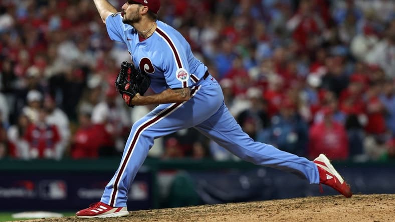 Nov 3, 2022; Philadelphia, Pennsylvania, USA; Philadelphia Phillies relief pitcher Zach Eflin (56) shows a pitch against the Houston Astros during the ninth inning in game five of the 2022 World Series at Citizens Bank Park. Mandatory Credit: Bill Streicher-USA TODAY Sports