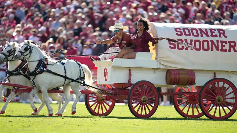 Nov 5, 2022; Norman, Oklahoma, USA; The Sooner Schooner enters the field after Oklahoma Sooners score a touchdown against the Baylor Bears during the first half at Gaylord Family-Oklahoma Memorial Stadium. Mandatory Credit: Chris Jones-USA TODAY Sports