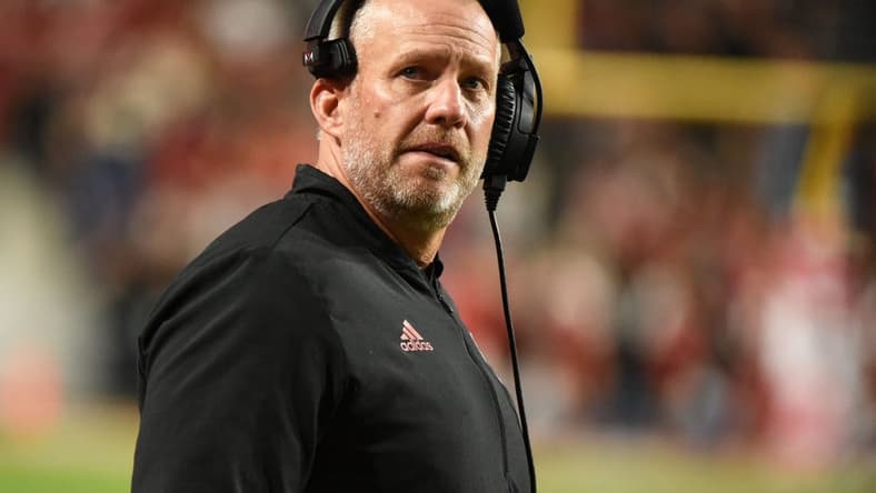 Nov 12, 2022; Raleigh, North Carolina, USA; North Carolina State Wolfpack head coach Dave Doeren watches a replay on the scoreboard during the second half against the Boston College Eagles at Carter-Finley Stadium. The Eagles won 21-20. Mandatory Credit: Rob Kinnan-USA TODAY Sports