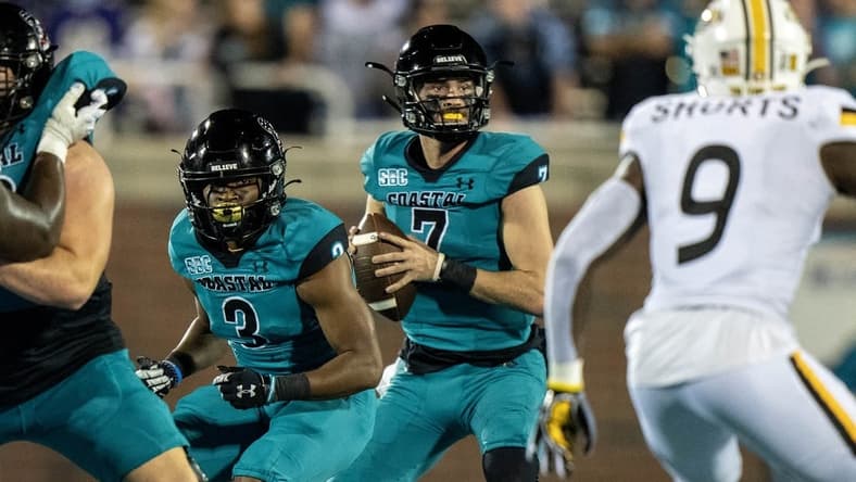 Nov 12, 2022; Conway, South Carolina, USA; Coastal Carolina Chanticleers quarterback Jarrett Guest (7) sets for a pass in the fourth quarter against the Southern Mississippi Golden Eagles at Brooks Stadium. Mandatory Credit: David Yeazell-USA TODAY Sports