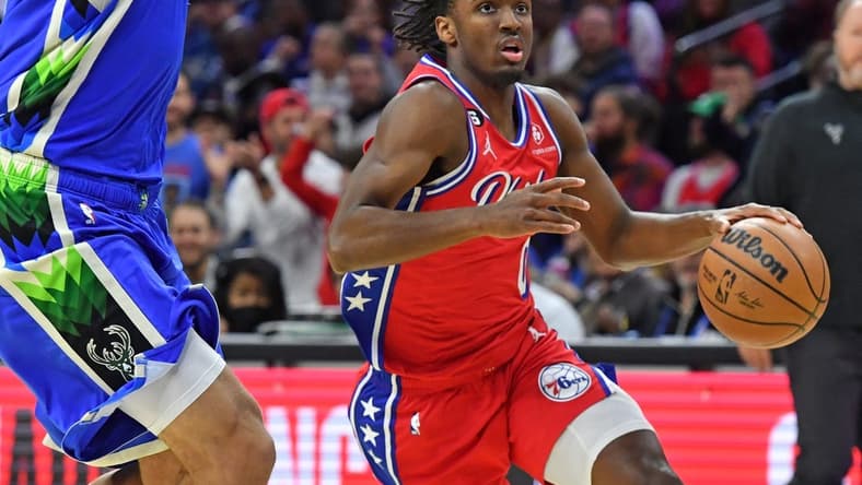 Nov 18, 2022; Philadelphia, Pennsylvania, USA; Philadelphia 76ers guard Tyrese Maxey (0) drives to the basket against Milwaukee Bucks center Brook Lopez (11) during the first quarter at Wells Fargo Center. Mandatory Credit: Eric Hartline-USA TODAY Sports