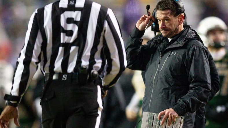 Nov 19, 2022; Baton Rouge, Louisiana, USA; UAB Blazers interim head coach Bryant Vincent talks to the side judge against the LSU Tigers during the second half at Tiger Stadium. Mandatory Credit: Stephen Lew-USA TODAY Sports