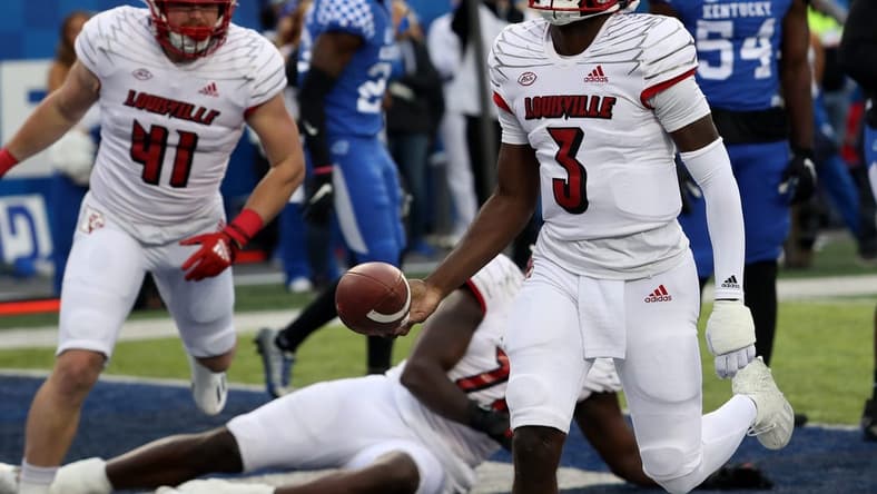 Louisville's Malik Cunningham runs for a touchdown against Kentucky.Nov. 26, 2022

Kentuckylouisville 12