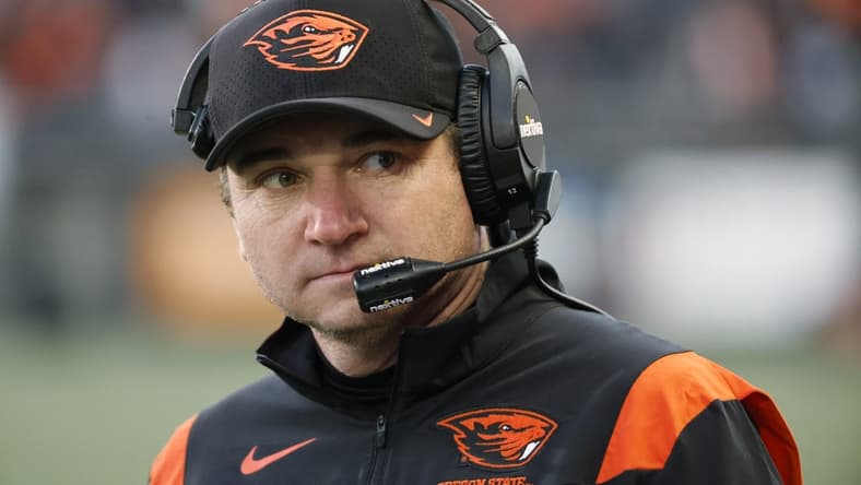 Nov 26, 2022; Corvallis, Oregon, USA; Oregon State Beavers head coach Jonathan Smith watches his team from the sidelines during the second half against the Oregon Ducks at Reser Stadium. Mandatory Credit: Soobum Im-USA TODAY Sports