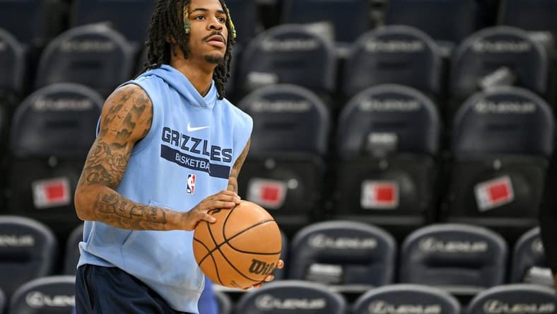 Nov 30, 2022; Minneapolis, Minnesota, USA; Memphis Grizzlies guard Ja Morant (12) participates in shoot around before a game against the Minnesota Timberwolves at Target Center. Mandatory Credit: Nick Wosika-USA TODAY Sports